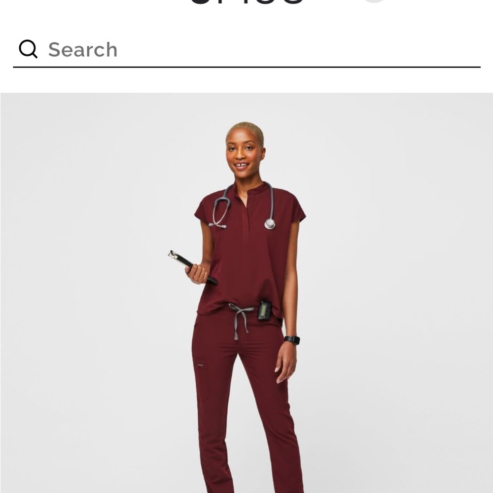 Burgundy rafael fig scrub top and jogger bottoms.